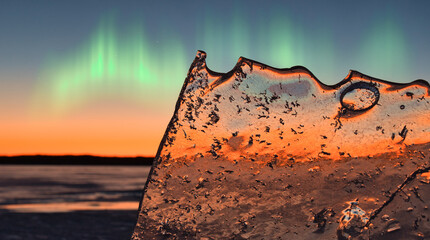 Wall Mural - lake in ice in spring against the backdrop of a red sunset