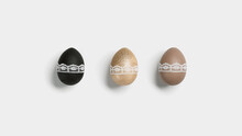 Easter Eggs Golden, Black And Beige Colored On White Background. Symbol Easter Holiday, Celebration Concept, Dyed Chicken Egg Bright Trendy Colors And Decorated Lace Tape. Minimal Flat Lay.