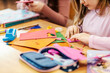 © Dusan Petkovic - Hands of girls making art project on arts and crafts at school.