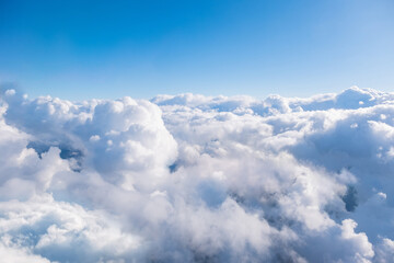 aircraft wing view from airplane window seat. beautiful sky and cloud.