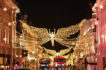 Angel Christmas Decorations In Night Time London With Double-decker Buses In Sight, Regent Street