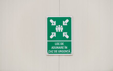 Emergency Assembly Point In Romanian Language (loc Adunare Caz De Urgenta) Sign On A Construction Site