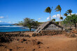 Reconstructed Hawaiian Hale facing the Pacific Ocean in the ancient fishing village in ruins of the Lapakahi State Historical Park on the island of Hawai'i (Big Island) in the United States
