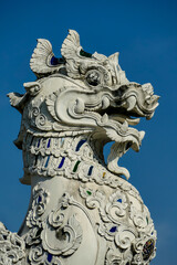 Wall Mural - chinese lion statue in bangkok thailand, digital photo picture as a background