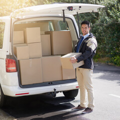 Poster - Striving for service excellence. Portrait of a friendly delivery man unloading cardboard boxes from his van.