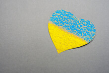 No War Kids Making Symbol Heart Ukraine Flag Painted Yellow Blue. National Symbol Ukraine Painted Child Drawing Heart Isolated On Gray Background. Save Ukraine Sign Support Concept Heart Shape Love UA