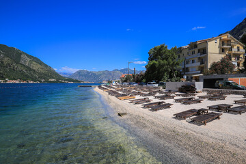 Wall Mural - Sun loungers on the beach in Kotor