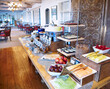 © Trinette Reed/Stocksy - Breakfast buffet at restaurant at luxury resort