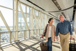 © Jayme Burrows/Stocksy - Senior Couple at Airport