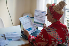 Woman Paying Bills Throug Online Bank