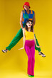 © BONNINSTUDIO/Stocksy - Couple in retro outfits having fun