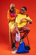© BONNINSTUDIO/Stocksy - Cheerful black couple in retro clothes