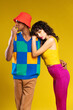 © BONNINSTUDIO/Stocksy - Multiracial couple in fancy retro clothes