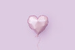 © Yaroslav Danylchenko/Stocksy - Violet balloon over the same color background