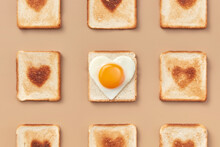 Sandwiches With Burnt Hearts And Egg