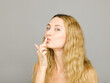 © ohlamour studio/Stocksy - isolated lip balm application