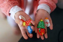 Christmas Gift Eraser In Child's Hand