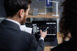 © Oleksii Syrotkin/Stocksy - Colleagues analyzing online cryptocurrency exchange