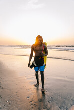 African Boy Lifeguard On The Beach