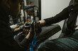 © Felipe Barrera/Stocksy - Professional Latin Tattooer Makes A Tattoo