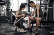 © ZQZ Studio/Stocksy - Young Asian couple exercising