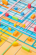 © Audrey Shtecinjo/Stocksy - Colourful background from geometric shapes and net
