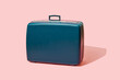 © Juan Moyano/Stocksy - blue retro suitcase