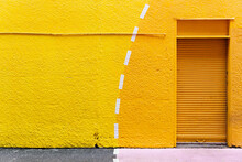 Yellow Wall With A Yellow Door