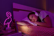 © Danil Nevsky/Stocksy - Tired child watching video at night