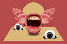 Surreal still life with eyeballs, open mouth and hands