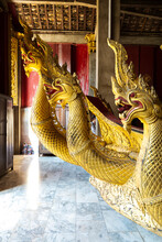 Golden Dragons In Buddhist Temple In Luang Prabang