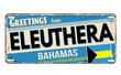 Greetings from Eleuthera vintage rusty metal plate