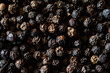 © Nadine Greeff/Stocksy - Food close up macro of black peppercorn spice.