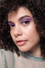 Model With  Curly Afro Hair And Purple Makeup