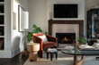 © Ali Harper/Stocksy - Interior image of a modern living room with fireplace