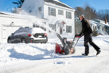 Man Cleans Up Snow After Blizzard With Snowblower