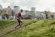 © Boris Jovanovic/Stocksy - Woman runing in park