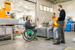 © STUDIO TAURUS/Stocksy - Workers Talking About Production