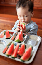 Cute Asian Baby Eating Watermelon 