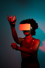 Using VR Glasses In A Room With Red And Blue Lights