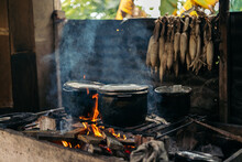 Saucepans On The Fire In A Rural Kitchen