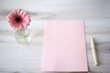 © Lauren Lee/Stocksy - Flower and pink paper