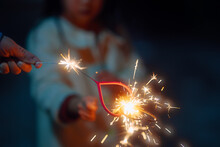 Child Playing With Sparklers 