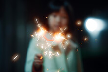 Child Playing With Sparklers 