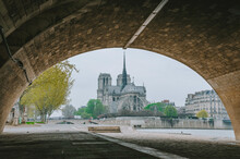 Panoramic View Of Notre Dame In Paris (Our Lady Of Paris) At Cloudy Sky. It Is A Medieval Catholic Cathedral, Considered To Be One Of The Finest Examples Of French Gothic Architecture.