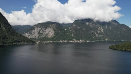 Wall Mural - Aerial view of Hallstätter See or Lake Hallstatt and big mountains Alps next to village Hallstatt in Austria, travel and nature concept