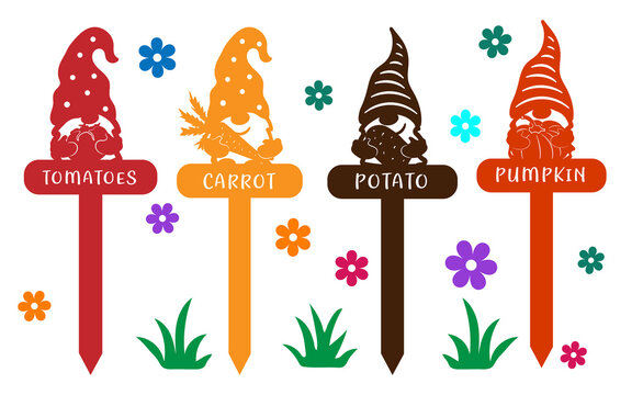 Decorative garden and garden toppers with gnomes and vegetables. Signs with carved elements