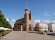 Famous Saint Mary's Basilica (Mariacki Church Kraków) at the Main Market Square in the Old Town district of Krakow, Poland.