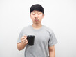 © Thanasak - Asian man holding coffee cup sleepy emotion portrait
