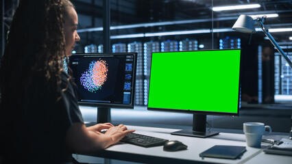 Poster - Professional Mature Female Heavy Industry Engineer Works on Green Mock-up Screen Computer. Professional Programming in a High Tech Development Laboratory Concept